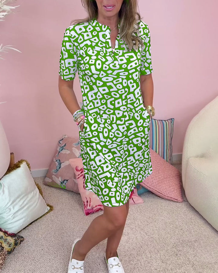 Viaro   | Printed dress with V-neck and pockets