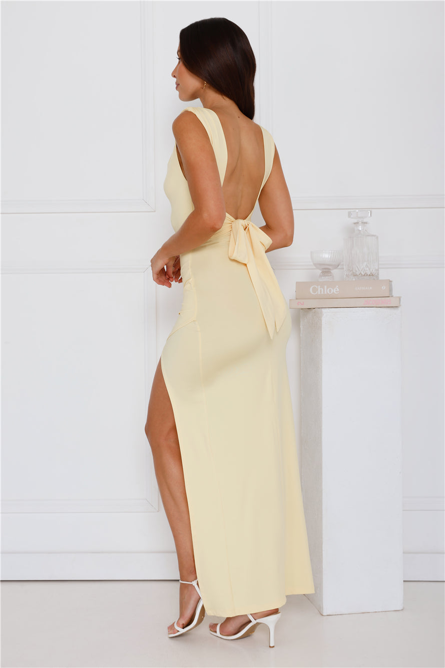Pink tight-fitting dress with a slit and ruching