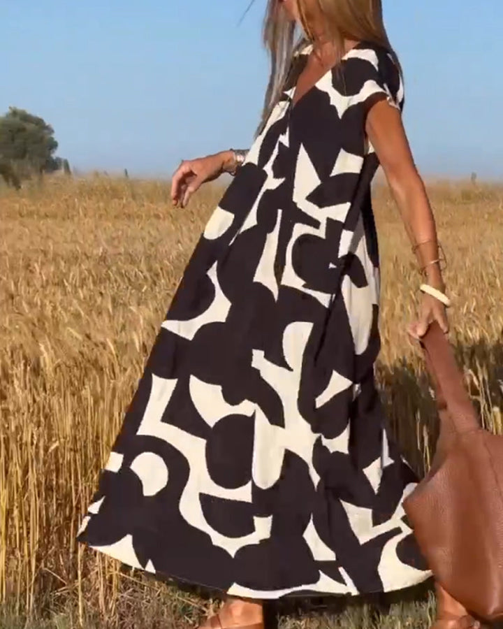 Amara - Maxi dress with print and V-neck